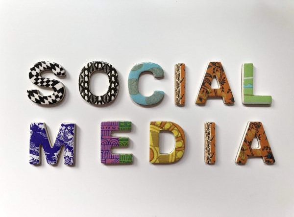 social media written with wooden letters